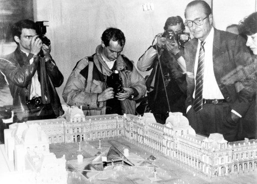 Paris Mayor Jacques Chirac with a model of the Louvre pyramid
