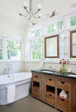 This open, light-filled bathroom includes a Hydro Systems (hydrosystem.com) standalone bathtub, as well as plumbing fixtures by Kohler (us.kohler.com) and Toto (totousa.com).