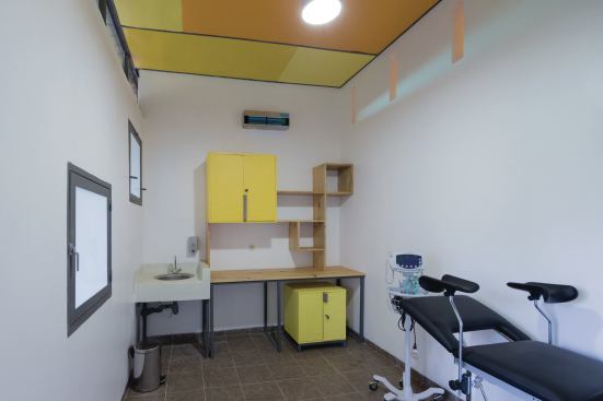 Custom millwork is seen again in the private exam room.