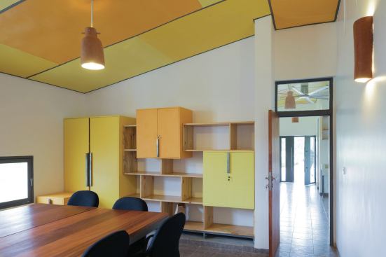 Conference room, with a view to the main entry beyond.