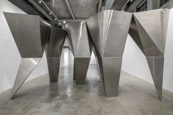 The “En Pointe” installation at the SCI-Arc Gallery features top-heavy, faceted columns that lean on each other for support and create a cohesive massing.