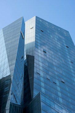 The building's fragments achieve the same degree of slope from the street as do terraced setbacks
