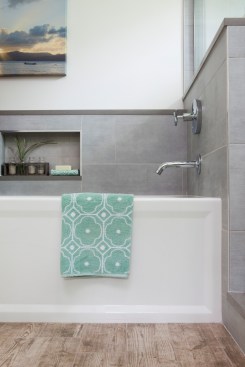Even with limited space in their bathroom, it was important to keep the tub because of the clients' younger children.