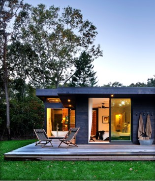 Large
windows and a slightly raised porch from the ground bring the outdoors into the
home.