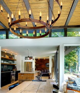 The
chandelier hangs from the beam system with woven natural rope, adding to the
consistent aesthetic the clients required.
