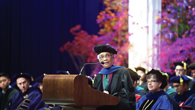 Sutton delivers a speech at the 2015 University of Washington convocation ceremony in Seattle