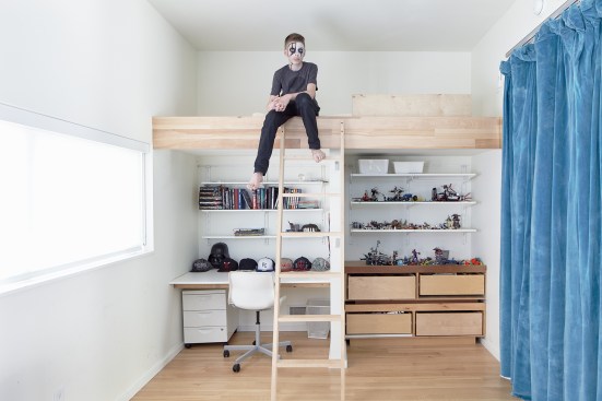 Kids’ bedroom with custom storage and loft bed