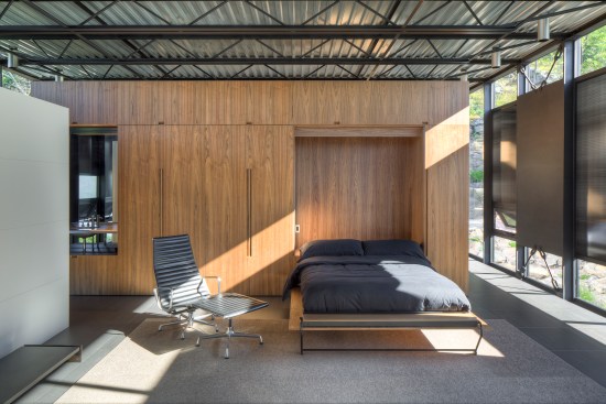 Guest bedroom with murphy bed lowered.