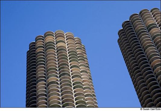 Bertrand Goldberg  Photographer: Susan Carr &copy; Esto  Marina City, Bertrand Goldberg’s 65-story mixed-use Chicago towers with scalloped edges and a corncob-like facade, were once the tallest reinforced concrete structures in the world. From the exterior, the lower floors of parking ramps are indistinguishable from the apartments above. Completed in 1965, Marina City is now home to the House of Blues concert hall.
