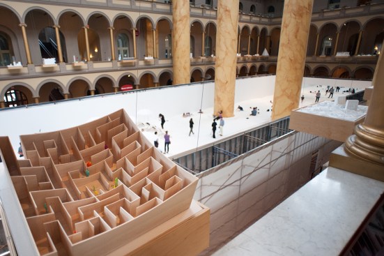 "The Beach" from above, seen behind a model of&nbsp;Bjarke Ingels Group (BIG)'s "BIG Maze"—last summer's installation at the museum.