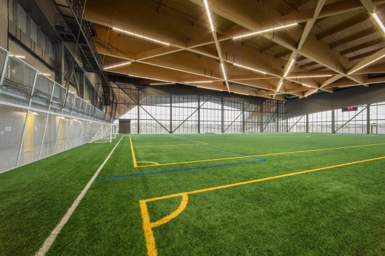 Indoor field, showing programming along edge, at left