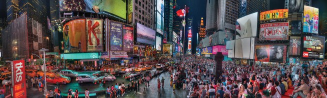 Times Square visitors take in the scene from the red steps of the TKTS booth and Sn&oslash;hetta’s granite benches