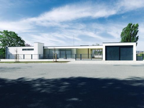 The street-level façade of the Villa Tugendhat serves as the main entry to the house.