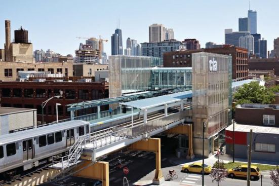 The new CTA station at Morgan and Lake features two stair towers flanking the elevated rail line.