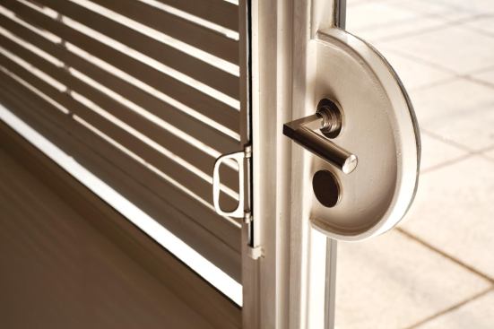 Custom door hardware leading to the terrace.