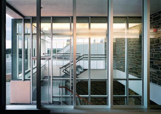Fire egress is accommodated by glass-enclosed indoor stairs that run directly alongside an exterior stair, with doors on each landing that allow students free run of the outdoors. "This is not a culture where we want to limit freedom," says Michael Carline, director of capital projects for St. Albans.