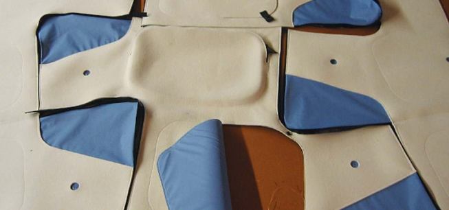 INTERIOR FELT "DRAPE"

Preliminary sketches for the felt drape system have been manufactured into large-scale mockups. There are voids in the felt to give access to the blue vapor barrier, and zippered pockets so that residents can actively use the surface for storage.