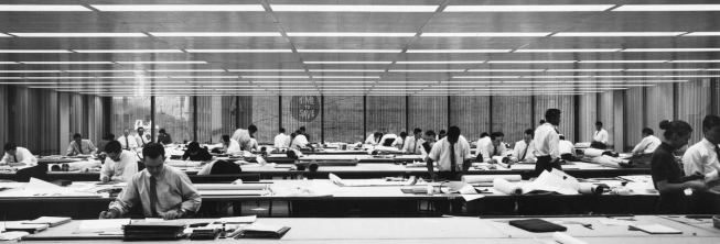 An archival photograph shows an interior of the Inland Steel Building not long after it was completed in the 1950s.