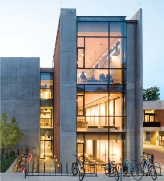 EAST ADDITION (VICTOR AND SONO ELMALEH WING),  2008 

Designed by W.G. Clark in collaboration with SMBW Architects, the East Addition—a slender, four-story pavilion—is a new icon for the campus. Its east façade thrusts toward Rugby Road, a busy pedestrian route, dressing up the back-of-house image that has characterized this approach to the building for decades. Designed primarily to increase the School of Architecture's space for pinups, the addition includes three loftlike rooms with concrete floors, maple ceilings, and expanses of glass that allow passersby to view the activity inside. “The review room is an extension of the teaching experience,” Clark says. “I wanted the building to show what we do.”  