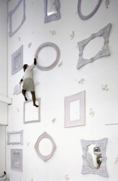 The climbing wall features traditional furnishings instead of faux rocks and plastic handholds.