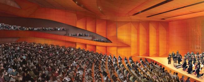 The curving wall system on the interior of the performance hall is composed of veneer-covered 3form panels attached to a series of onedirectional structural trusses and laser-cut steel fins. This customized structural system allows Philips Color Kinetics LEDs, installed behind the resin panels, to create a uniform, shadowless glow across all of the hall's wall surfaces.
