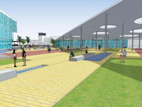  "Getting a building was only half of what the city wanted-they really wanted to revitalize the downtown." For a civic center, the design team created a series of low buildings with green roofs that angle down to meet the ground plane. Colonnades shade public plazas and define circulation paths between buildings.