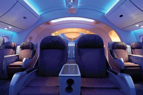 A "simulated sky" ceiling treatment created by arrays of LEDs (programmed to change from a daylight scene to a nighttime presence) connects travelers to the experience of flight.