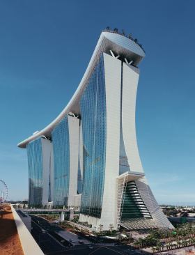 The massive cantilever was not the only structural feat: Because of the sloping forms at the base of the hotel towers, a temporary system of struts and tension cables was devised to support the structure until the curving walls met at the 23rd story. The struts were removed, but the cables were left in place and tucked into the concrete structure.