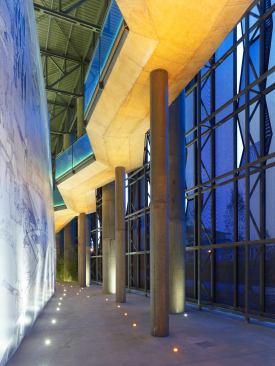 The steel façade acts like "metal tulle," allowing views inside and outside, the architect says.