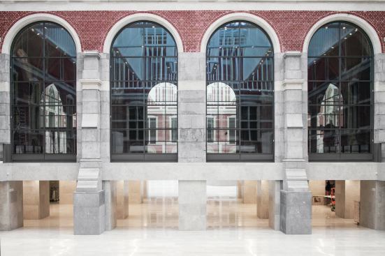 Underneath the restored Passageway, a starkly modern throughway connects the two courtyards.