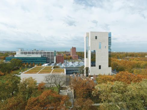The Logan Center comprises a tower and two wings (capped in saw-toothed and green roofs, respectively). The façades are clad not in the traditional Indiana limestone of other university buildings, 

but in a warmer-toned version that is quarried 

in Missouri.