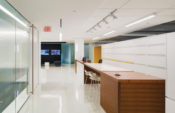 The reception desk is one of the few pieces of completely new furniture in the space and was customized with FSC-certified walnut panels. Other new finishes, where possible, were chosen for high recycled content and local sourcing.

Storage

Inscape Solutions



Storwal storage system

inscapesolutions.comReception Desk

 Tuohy



Custom desk in FSC-certified walnut

tuohyfurniture.comStool

Kristalia



BCN stool

kristalia.it