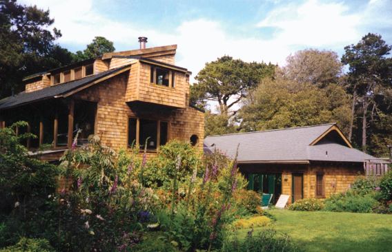 Highland House, Van der Ryn’s home in Inverness, Calif., has been a continuous work in progress since 1972. The main part of the house is a pole barn with cedar floors.