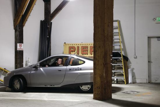 Mithun has three company hybrid cars at the Seattle office, including a Honda Insight nicknamed Buzz. A Toyota Prius is named Ohmr, after the firm’s founder, Omer Mithun.