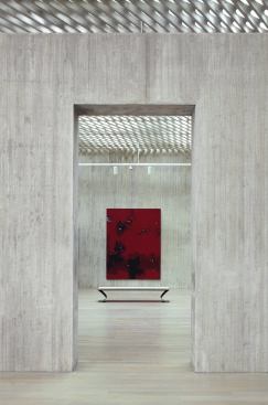 Although the bulk of this collection resides in storage, the pieces that rotate through the second-floor galleries receive ample, diffuse light from a custom-formed, cast-in-place, perforated concrete ceiling with skylights and integrated electric lighting. 