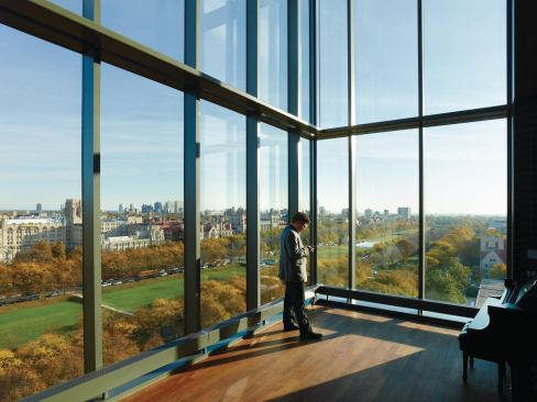 The penthouse performance space in the Reva and David Logan Center for the Arts overlooks the Midway Plaisance, a relic of the 1893 World’s Fair, toward the Collegiate Gothic core of the campus.