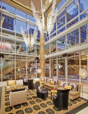 The hotel’s double-height lobby at the corner of State and Lake streets features floor-to-ceiling glazing, which encourages people on the adjacent elevated trains to look inside, making this an ideal location to see and be seen. Interiors by Beverly Hills, Calif.–based Cheryl Rowley Design depart from the hotel chain’s business-casual norm.