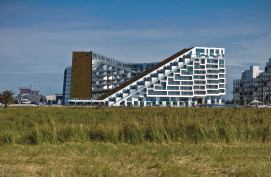 The project is sited adjacent to farmland.