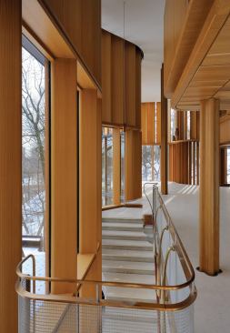 View looking across stair to living room/performance space.