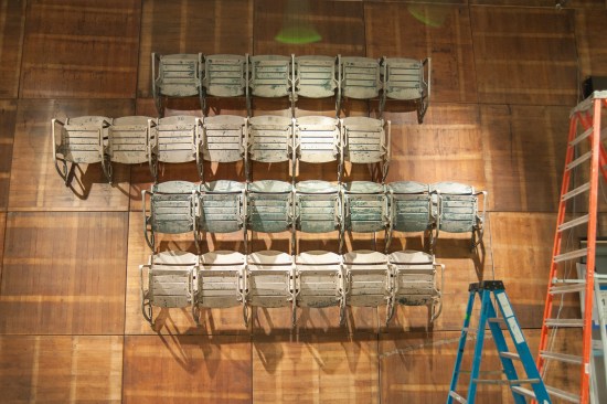 Original seating from Uline Arena becomes a wall installation.To “honor the original court floor,” RTKL’s Alex Shapleigh says, wood panels used to cover the ice hockey rink during basketball games finish the east interior wall. The flooring was shrewdly stored off-site in a warehouse during the arena’s vacancy. Originally in 4x8 sheets, the panels were cut into 4-foot squares.