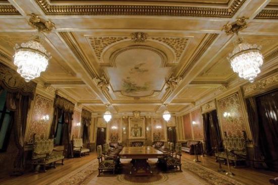 The cut crystal luminaires of the ceremonial Gold Room provided concealment opportunities for miniature halogen uplights.