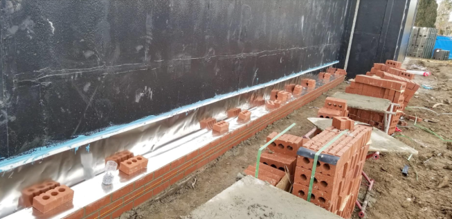 Installation of flexible stainless steel flashing courtesy of York Flashings.